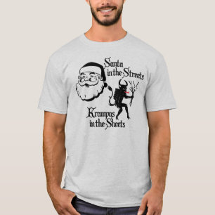 T-shirt Père Noël dans les rues. Krampus dans les feuill