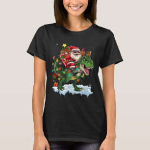 T-shirt Père Noël équitation Dinosaur T Rex lumières des a