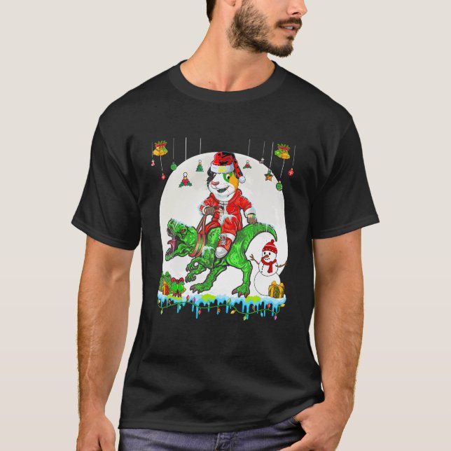 T-shirt Père Noël Guinée équitation Pig T Rex lumières de  (Devant)