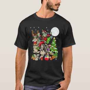 T-shirt Père Noël montant un chat American Shorthair à ren
