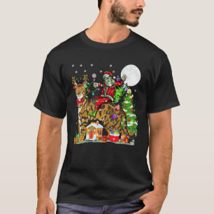 T-shirt Père Noël montant un chat Bengal au sapin de Noël