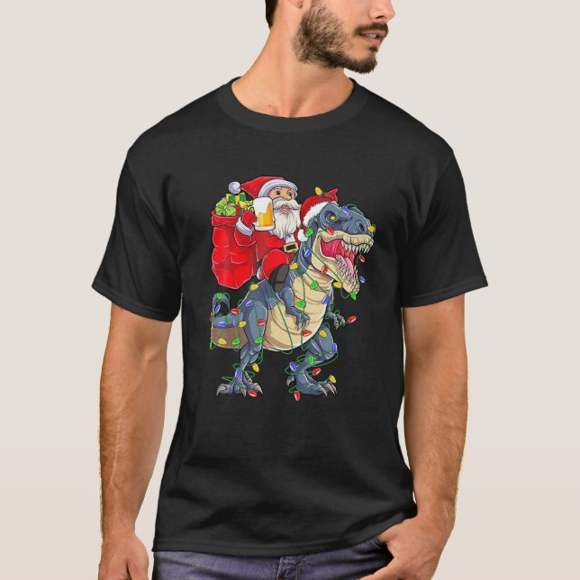 T-shirt Père Noël Riding A Dinosaur Christmas Tree T Rex B (Devant)