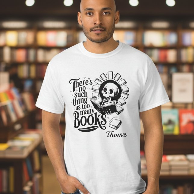 T-shirt Personalized No Such Thing As Too Many Books (White bookworm t-shirt worn by a man with background book shelves out of focus)
