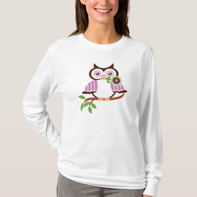 T-shirt Petite chouette de printemps tenant une fleur dans (Devant)