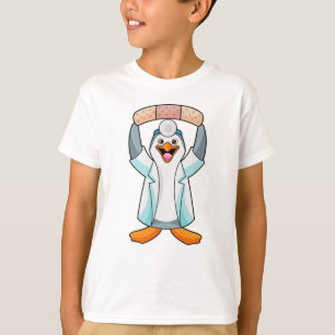 T-shirt Pingouin comme docteur avec plâtre