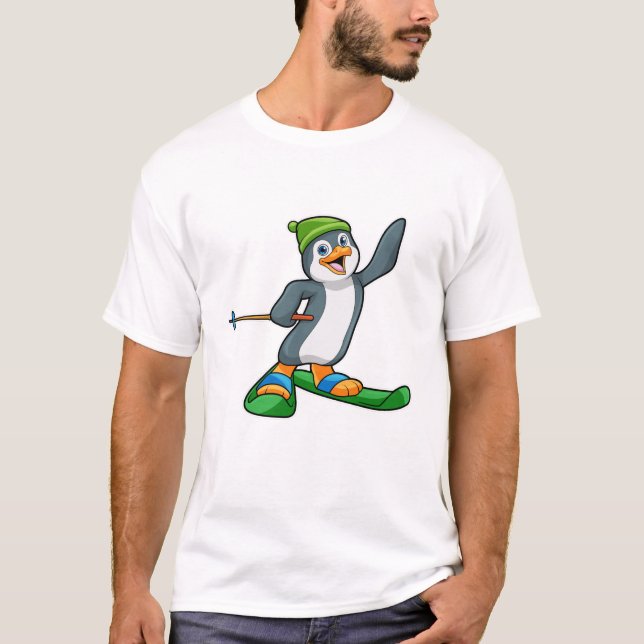 T-shirt Pingouin comme skieur avec ski et Casquette (Devant)