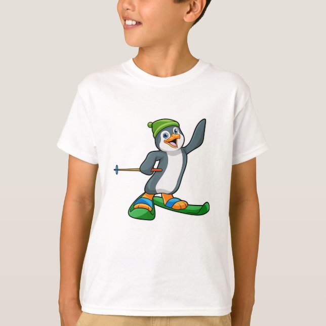 T-shirt Pingouin comme skieur avec ski et Casquette (Devant)