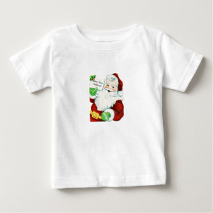 T-shirt Pour Bébé Père Noël indique : Premier Noël de Babys
