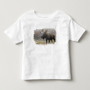 T-shirt Pour Les Tous Petits Orignal mâle dans une tempête de neige avec des tr