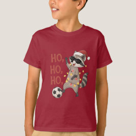 T-shirt Raccoon with lights and Christmas hat playing socc