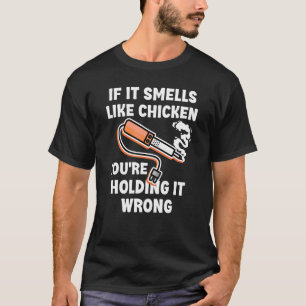 T-shirt Si ça sent le poulet, vous le tenez mal