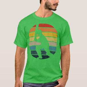 T-shirt Silhouette Du Joueur De Cricket Sur Un Su Rétro Pe