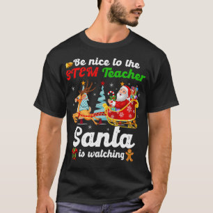 T-shirt Soyez Gentil À L'Enseignant STEM Père Noël Regarde