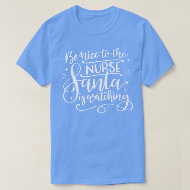T-shirt Soyez Gentil Avec L'Infirmière Père Noël Regarde L (Design devant)