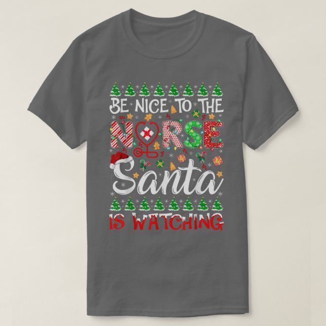 T-shirt Soyez Gentil Avec L'Infirmière Père Noël Regarde P (Design devant)