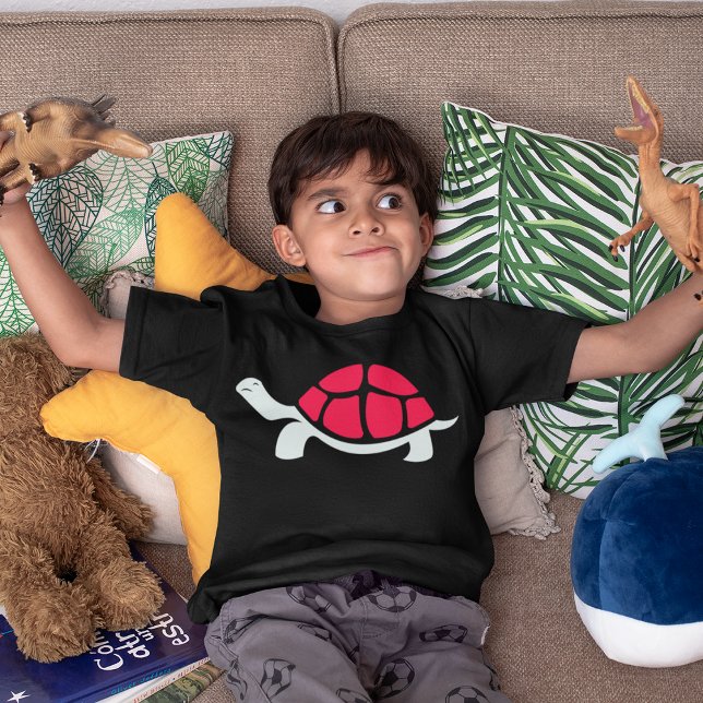 T-shirt Tortue rouge (Boy playing with dinosaur, wearing red shell turtle design)