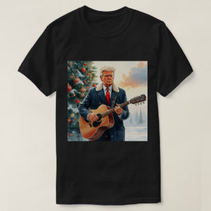 T-shirt Trump jouant à la guitare acoustique par sapin de