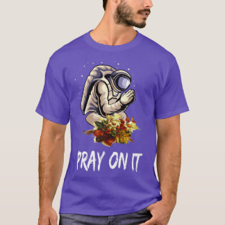 T-shirt Un astronaute priant un homme d'espace prie la Flo