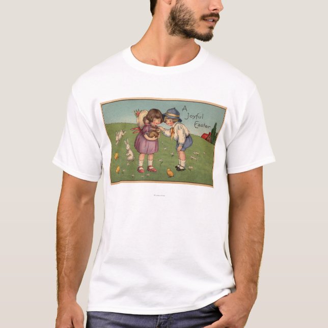 T-shirt Un EasterKids joyeux tenant un lapin (Devant)
