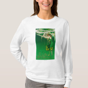 T-shirt Une femme en vert tenant une scène de tuyau
