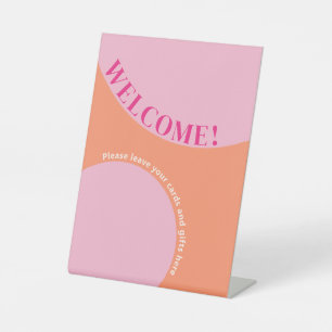 Tabellenzeichen geometrisches Rosa und Orange Sockelschild