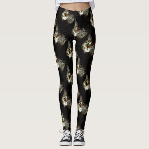 Tablettenkatze mit Abgeschiedenen grünen Augen auf Leggings