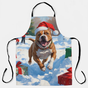 Tablier Chien Pitbull courant dans la neige avec un chapea