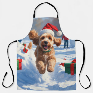 Tablier Cockapoo courant dans la neige avec un chapeau de