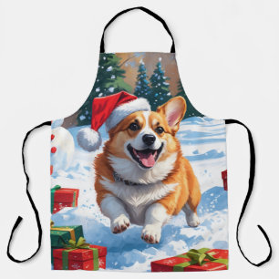 Tablier Corgi courant dans la neige avec un chapeau de Noë
