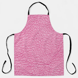 Tablier Cuir rose gros plan, arrière - plan texturé.