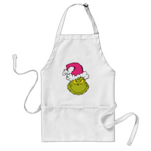 Tablier Grinch avec un chapeau de Père Noël rose