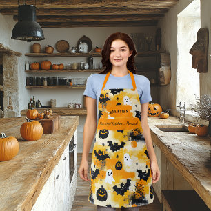 Tablier Halloween jaune avec des fantômes, des citrouilles