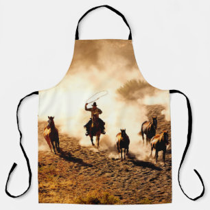 Tablier Les cow-boys à la recherche de chevaux sauvages. l