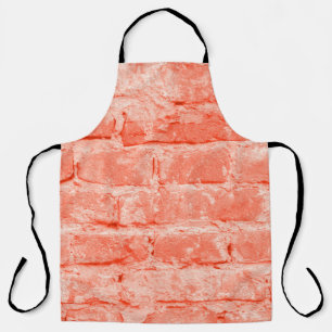 Tablier Living Coral. Brick wall background. Closeup horiz