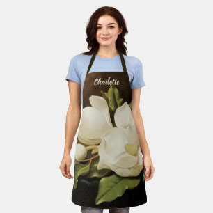 Tablier Magnolias géants sur un tissu de velours bleu par