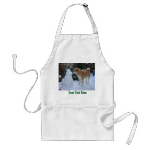 Tablier mignon chien akita embrasser le bonhomme de neige 