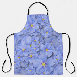 Tablier motif sans couture textile avec fleurs bleues. dec