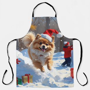 Tablier Pomeranian courant dans la neige avec un chapeau d