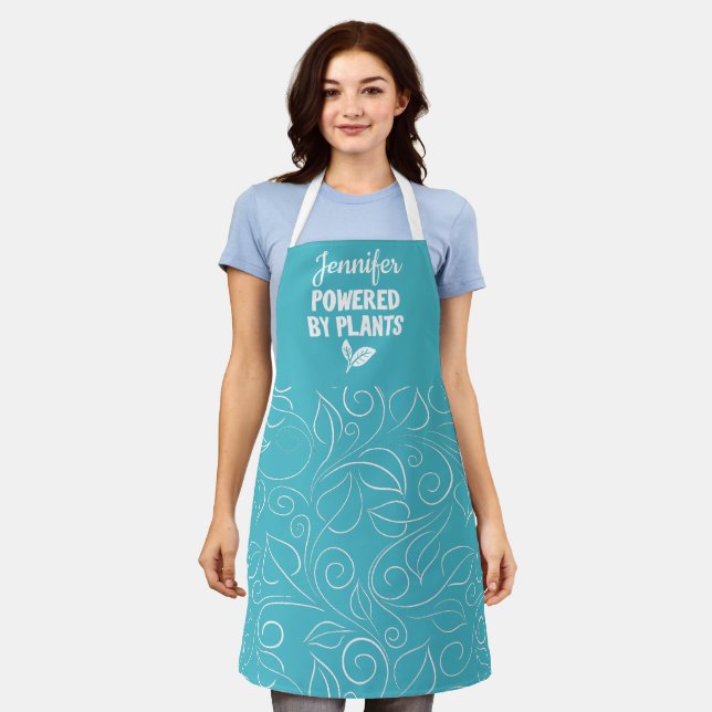 Tablier Powered by plante Vegan floral turquoise avec nom (Porté)