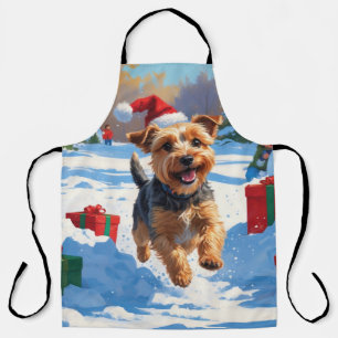 Tablier Skye Terrier courant dans la neige avec un chapeau