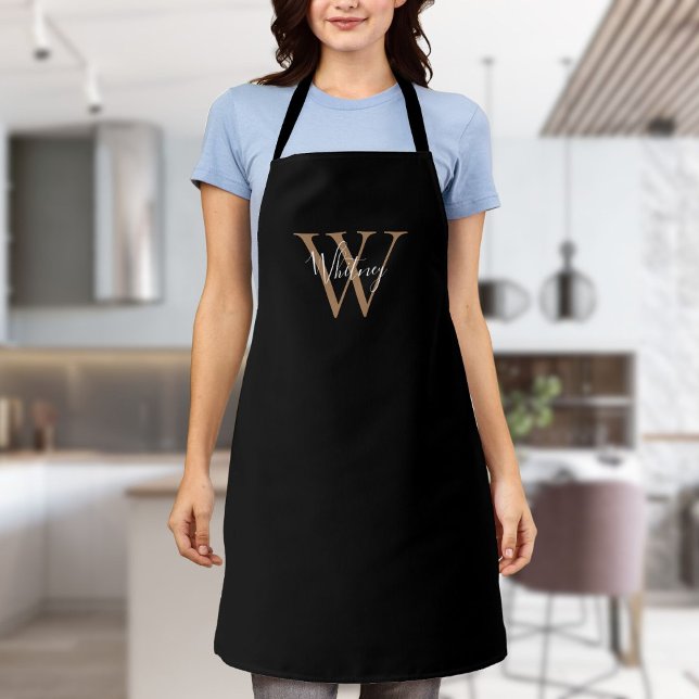 Tabliers à monogramme noir et or initial script él (Elegant Script Initial Black Gold Monogram Apron)