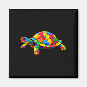 Tag des Autismus: niedliche Schildkröte und Puzzle Magnet