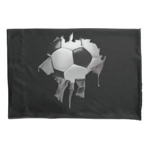 Taie d'oreiller sombre déchirée de football