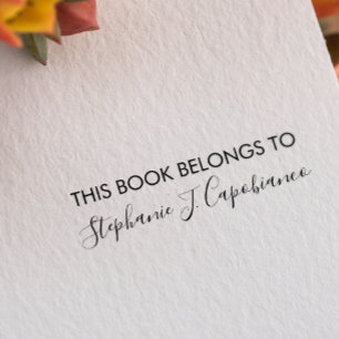 TAMPON AUTO-ENCREUR  CURSIVE ÉLÉGANT CE LIVRE APPARTIENT À AJOUTER VOTR