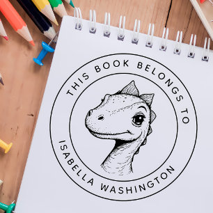 Tampon Auto-encreur Custom Baby Dino Ce livre appartient au nom de l'e