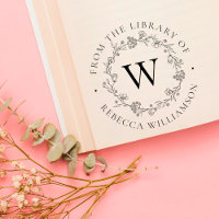 Monogramme et couronne florale de la bibliothèque 