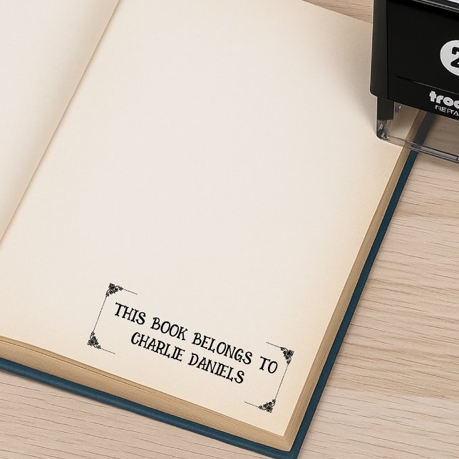 Tampon en caoutchouc auto-encreur d'ex-libris élég (This books belongs to Charlie Daniels)