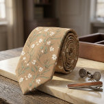 Tan Wildflower Delicate White Blossom & Leaves  Krawatte<br><div class="desc">Bring gentle, timeless romance to your wardrobe with this exquisite tan necktie blooming with delicate wildflowers! A graceful scatter of petite white blossoms, soft green leaves, slender stems, and subtle foliage creates a light, airy botanical pattern across a warm, earthy beige-tan background, evoking peaceful meadows and vintage pressed-flower elegance. This...</div>