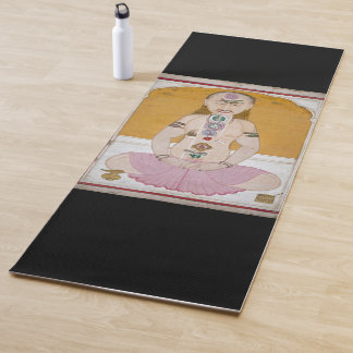 Tantric Yogi, der chakras und kundalini zeigt Yogamatte