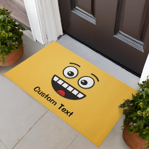 Tapis de sol avec visage souriant et bouche ouvert